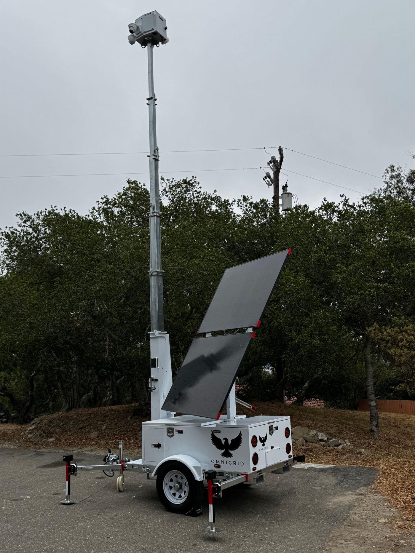 Sunhawk-1 solar security trailers in the yard